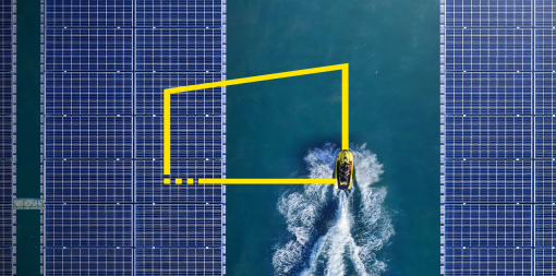 ey-aerial-view-of-jetski-between-solar-panels-floating-in-a-dam