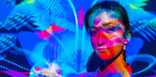 ey-colorful-portrait-of-woman-with-projector-multicolor-light-illumination